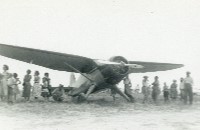 Airplane and unidentified people, circa 1955 (008-004-113)