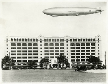 Navy Dirigible floats over newly constructed Montgomery Ward building in September 1928