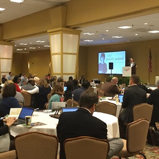 Commissioner Brooks providing welcome remarks at Poverty Summit in Fort Worth, TX