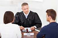 Couple talking to Judge