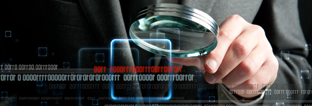 Magnifying glass looking at data.