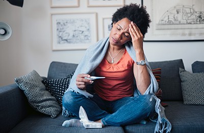 woman sick with flu