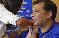 TCPH Director Vinny Taneja gets flu shot